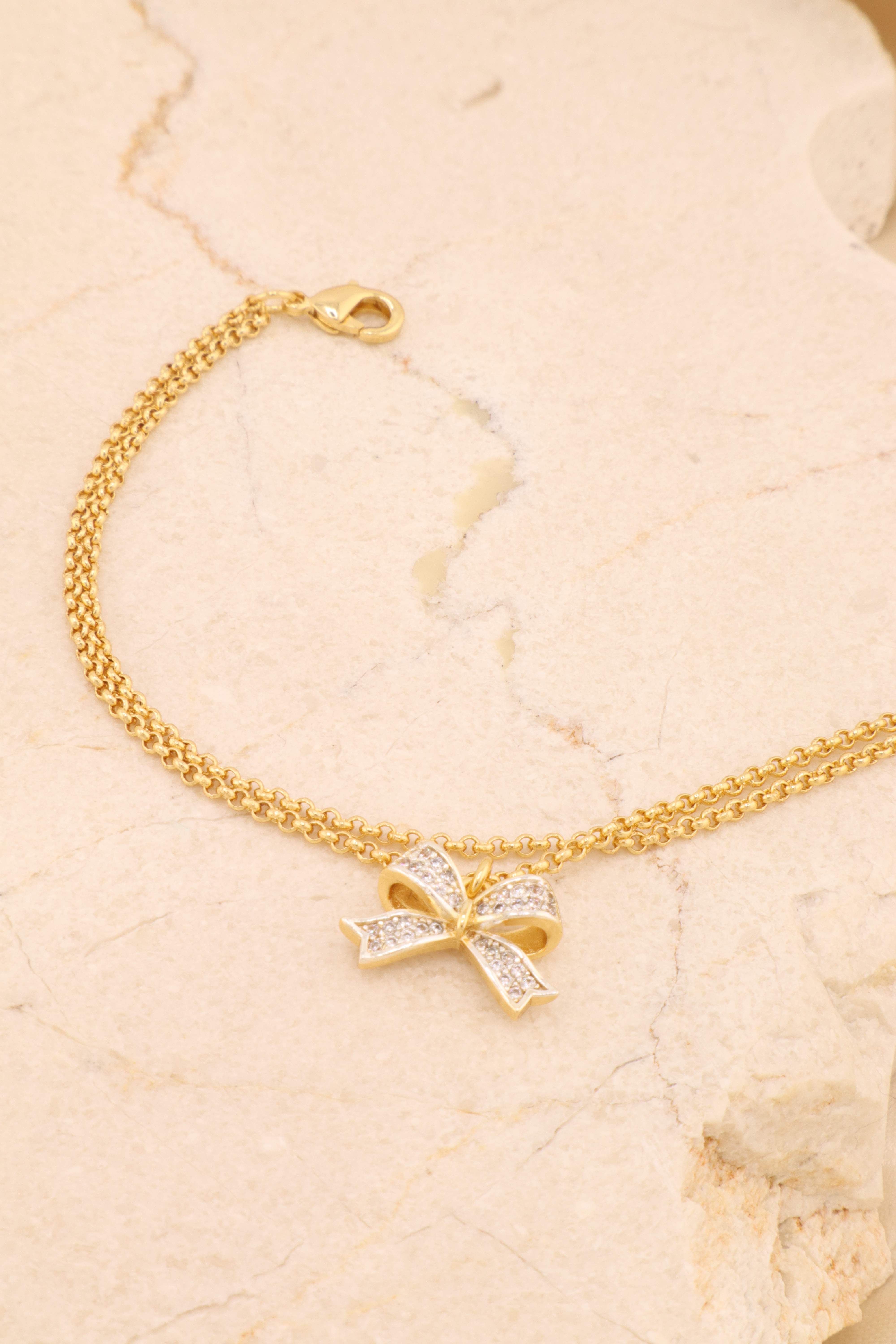 PULSEIRA PINGENTE LACINHO CRAVEJ