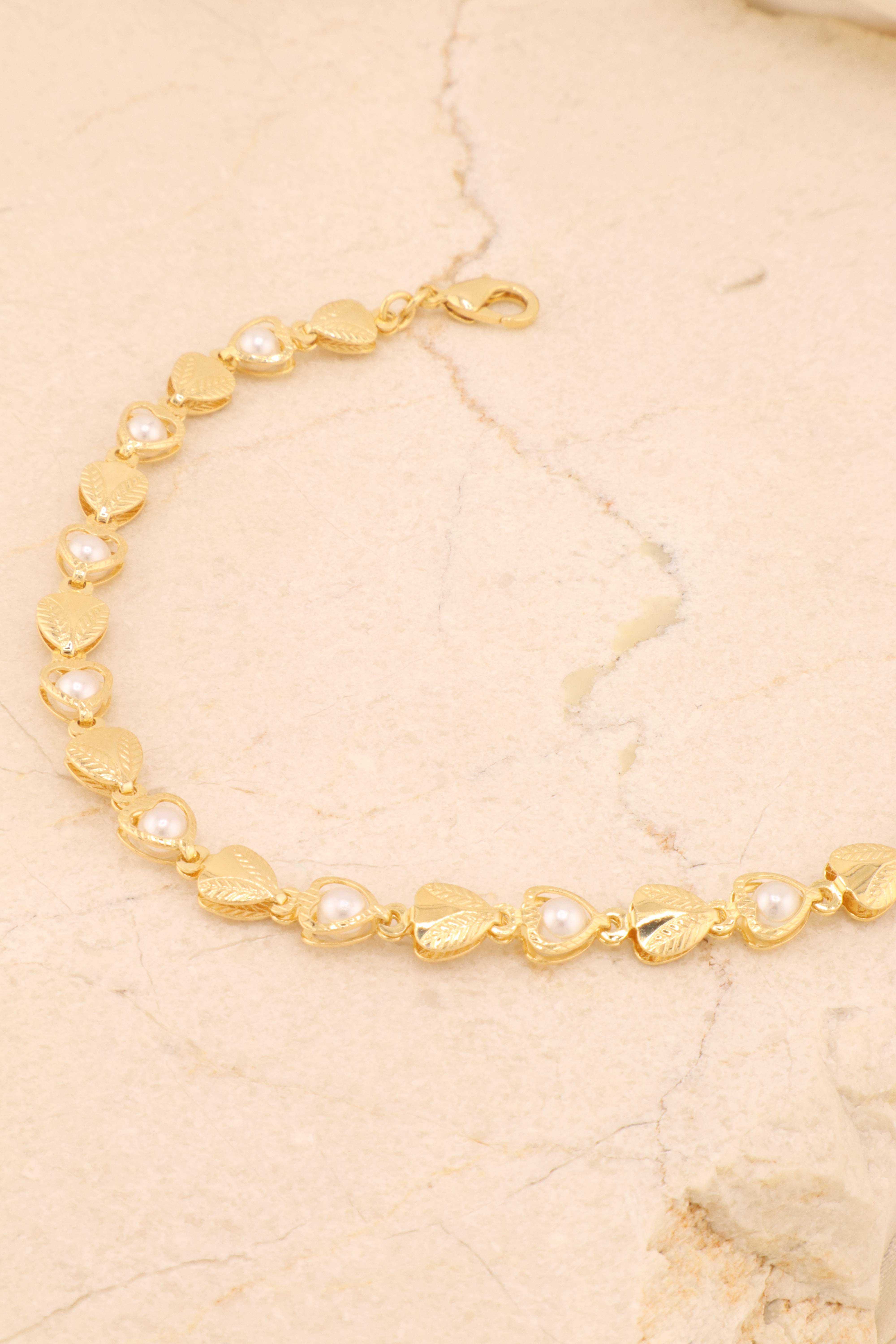 PULSEIRA  CORAÇÃO COM PÉROLA E CORAÇÃO DETALHE FOLHA