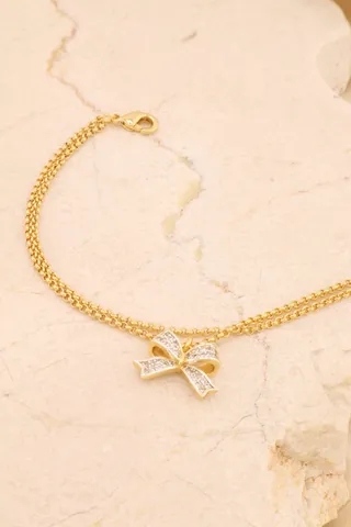 PULSEIRA PINGENTE LACINHO CRAVEJ